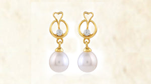 Ladies, make a lasting statement with these heavy pearl earrings