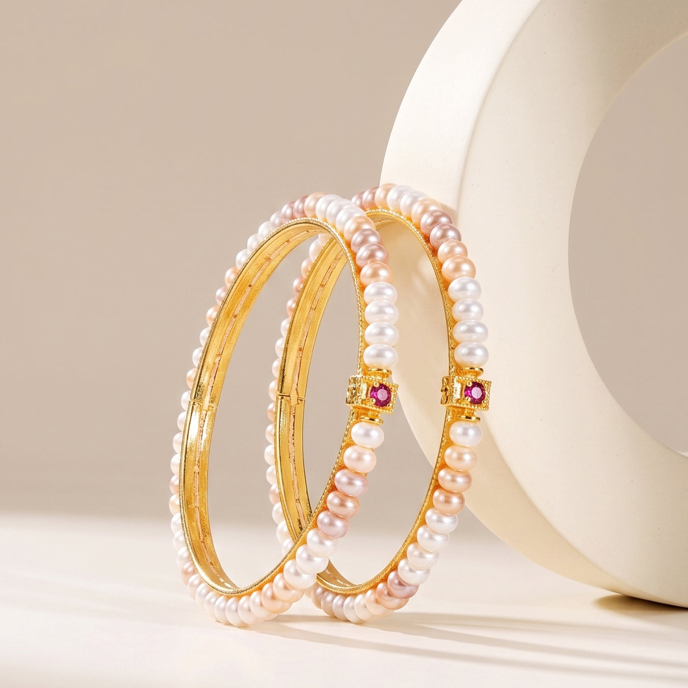 Pink and white pearl bangle
