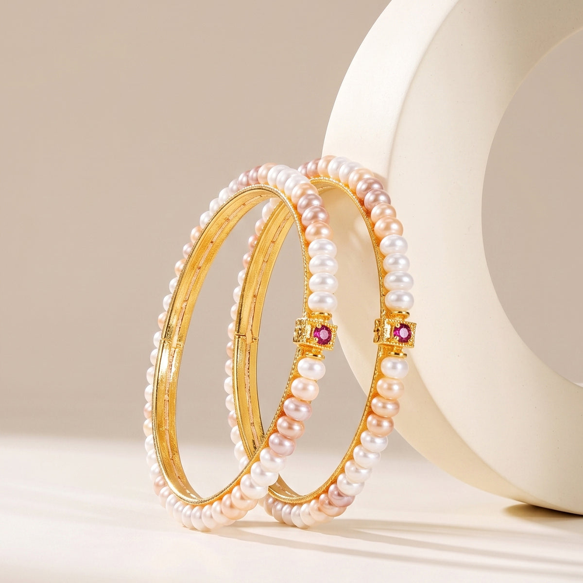 Pink and white pearl bangle