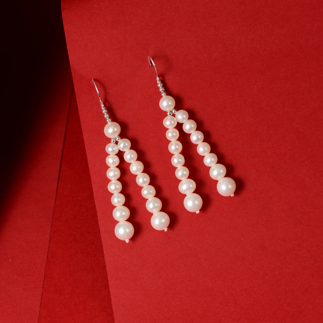 Twin cascading pearl strands (Pearl Drop Earrings)
