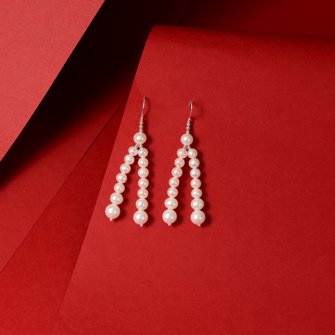 Twin cascading pearl strands (Pearl Drop Earrings)