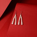 Twin cascading pearl strands (Pearl Drop Earrings)