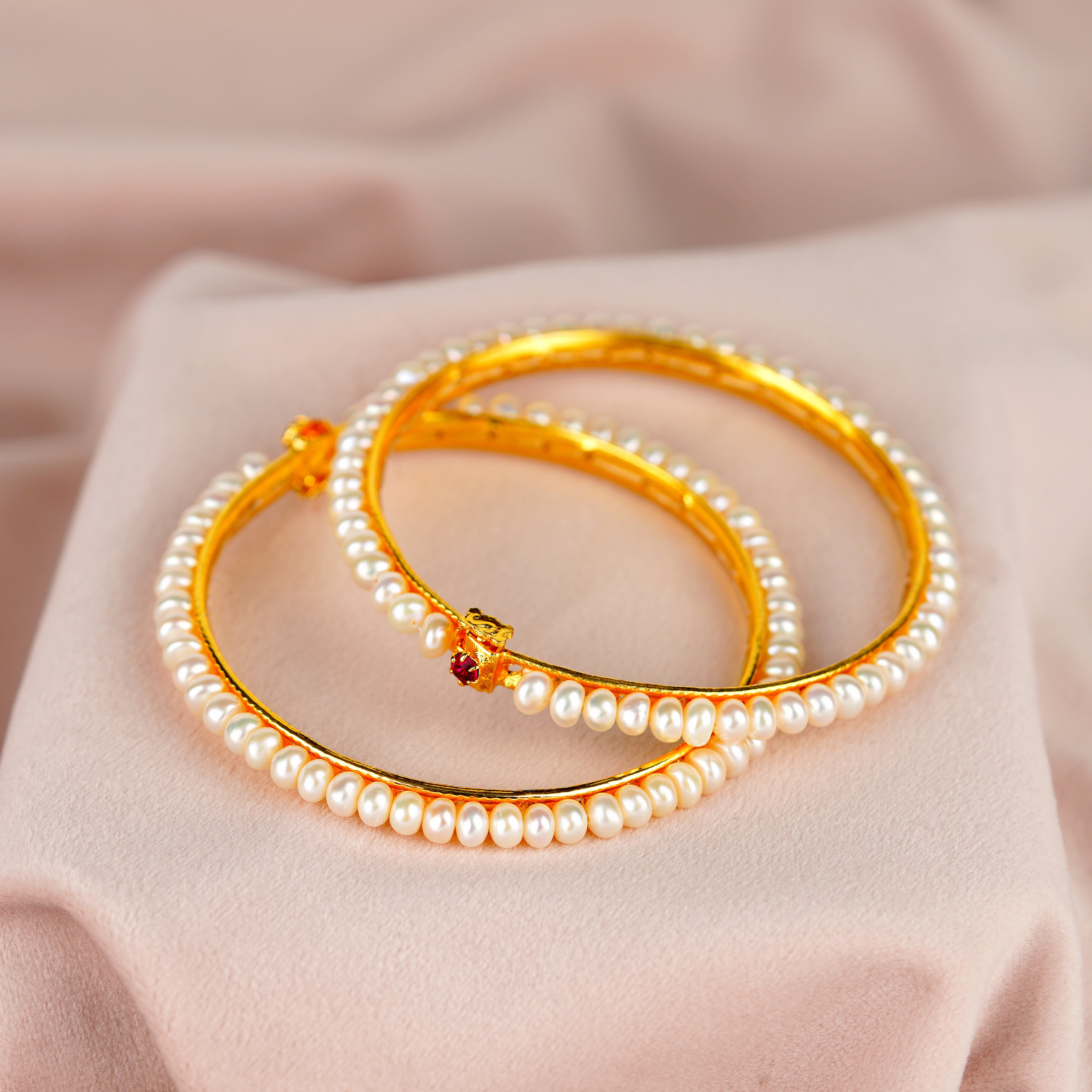 Elegant White Pearl Bangles with Sparkling Red Stones - Krishna Pearls