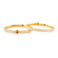 Elegant White Pearl Bangles with Sparkling Red Stones