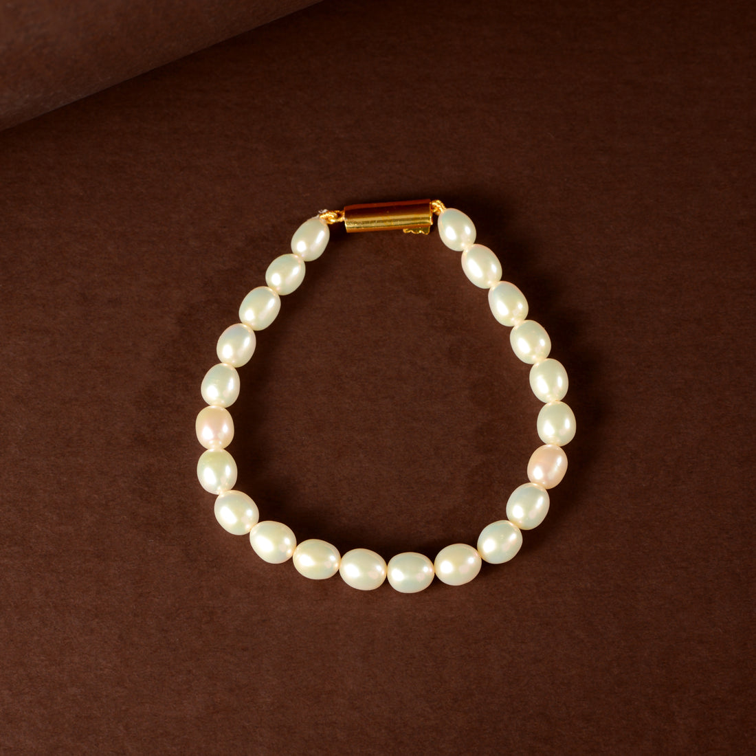 Ivory Link Pearl Bracelet ( Fresh water Pearls With Gold Polished Clip In Silver )