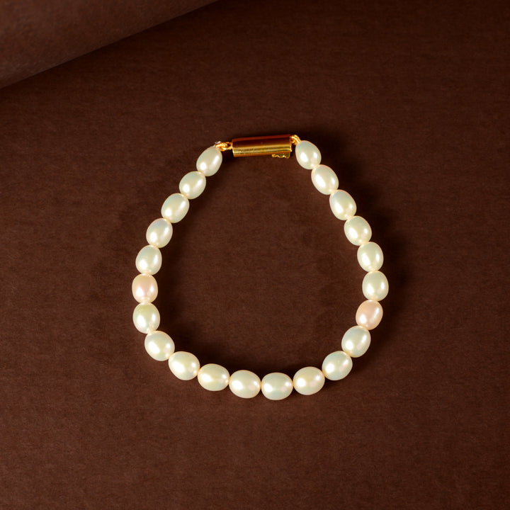 Ivory Link Pearl Bracelet ( Fresh water Pearls With Gold Polished Clip In Silver )