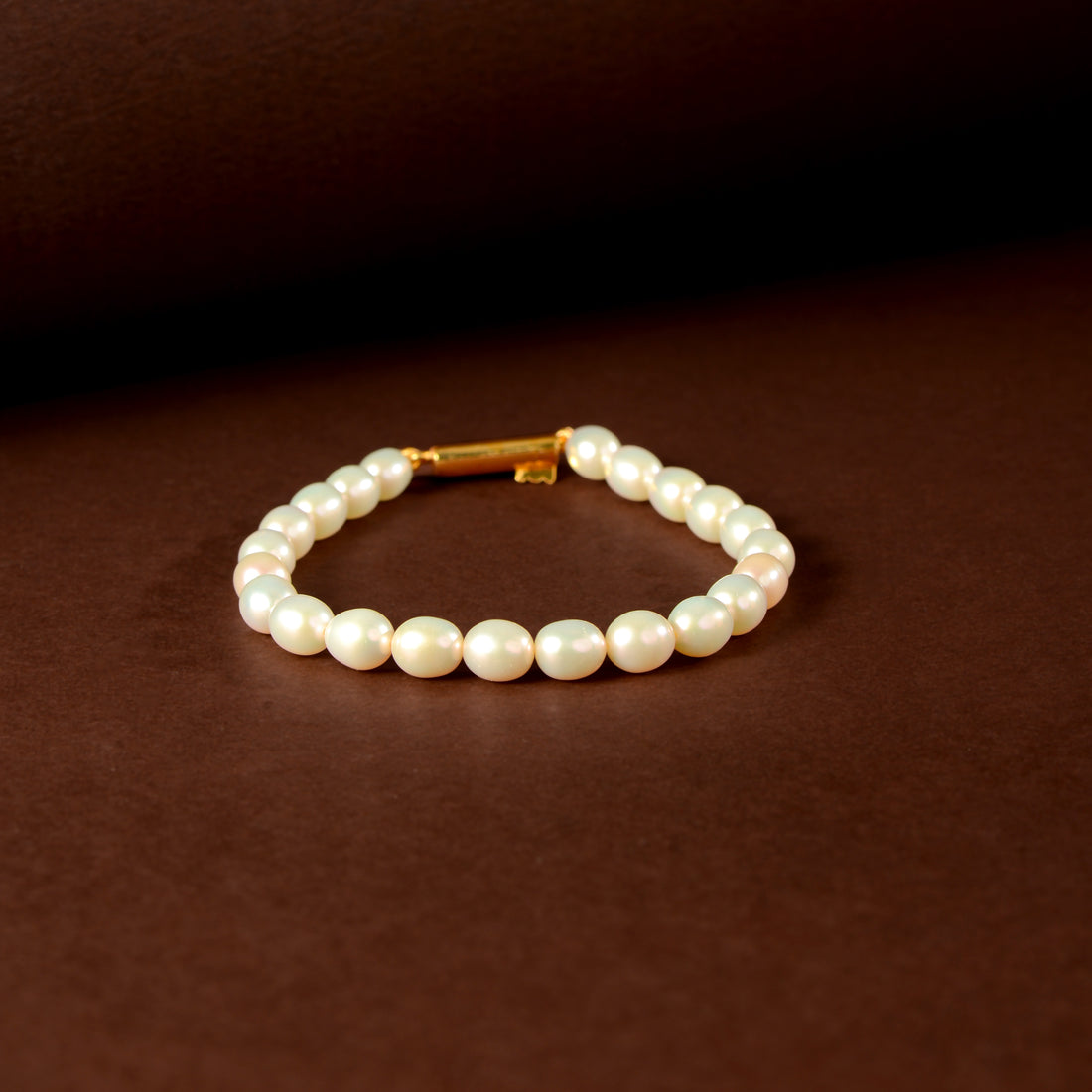 Ivory Link Pearl Bracelet ( Fresh water Pearls With Gold Polished Clip In Silver )