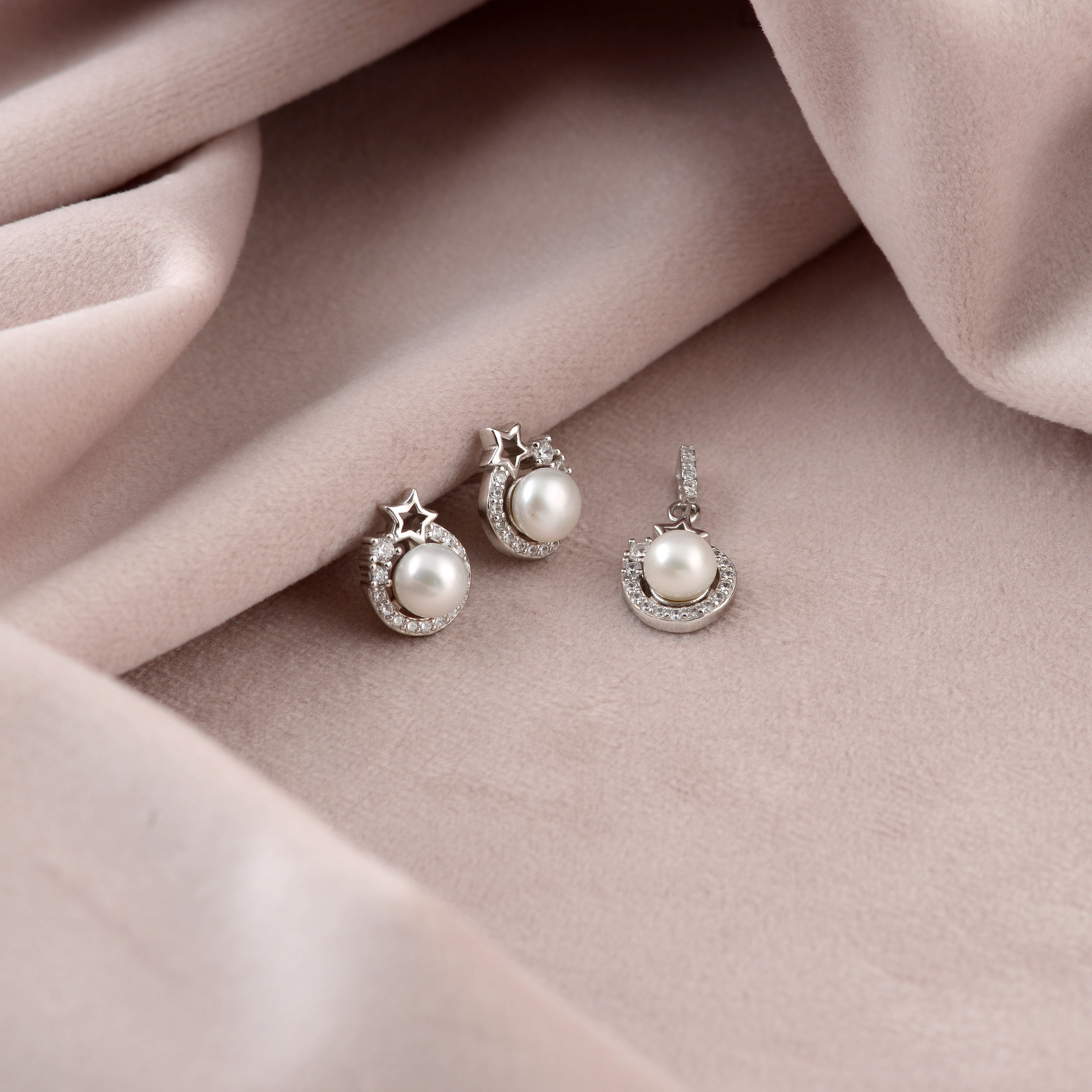 Button Pearl Studs In Captivating Star Designs - Krishna Jewellers Pearls and Gems