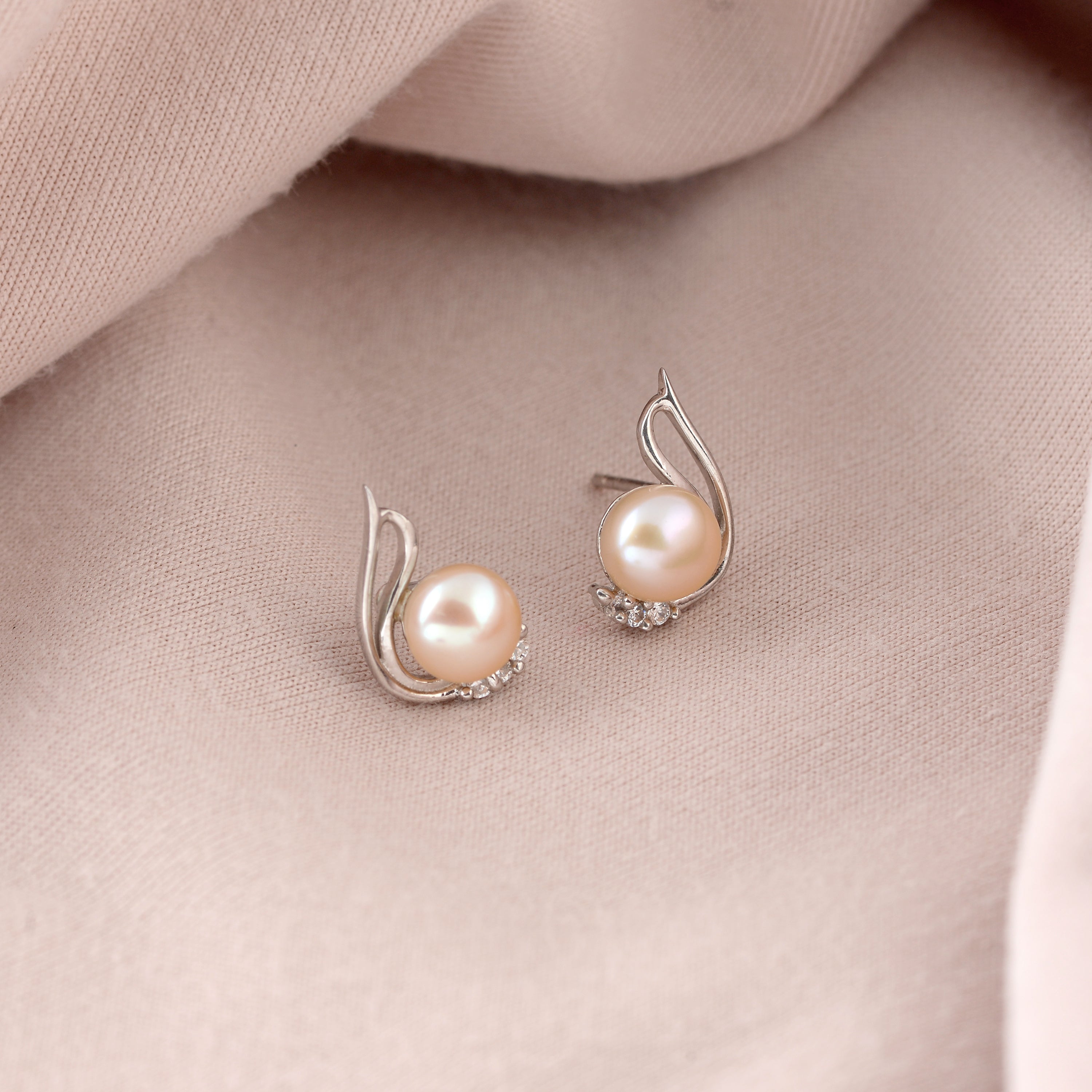 Celestial Glow: Unique Pearl Studs With CZ Sparkle - Krishna Jewellers Pearls and Gems