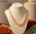 Traditional Graded Oval Peach and Pink Pearl Necklace
