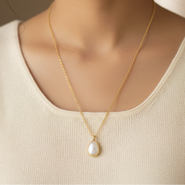 Modern Silver Fresh Water Pearl Pendant Necklace with a Gold Coating