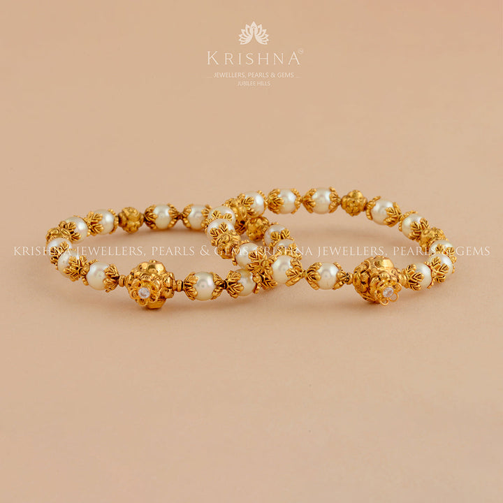 Gold Bangles With Nakshi Balls - Krishna Jewellers Pearls and Gems