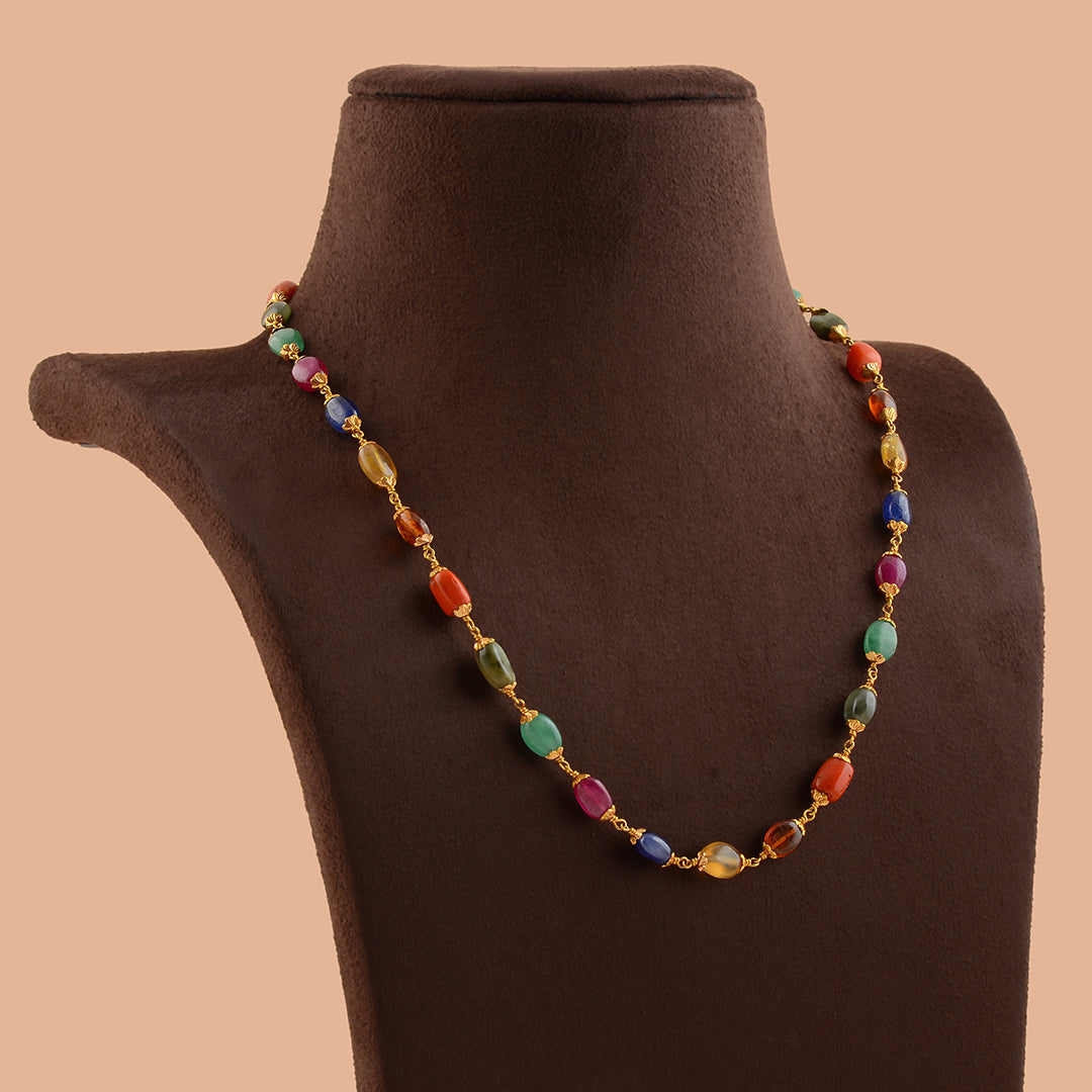 Celestial Sparkle: Navaratna Gold Necklace - Krishna Jewellers Pearls and Gems