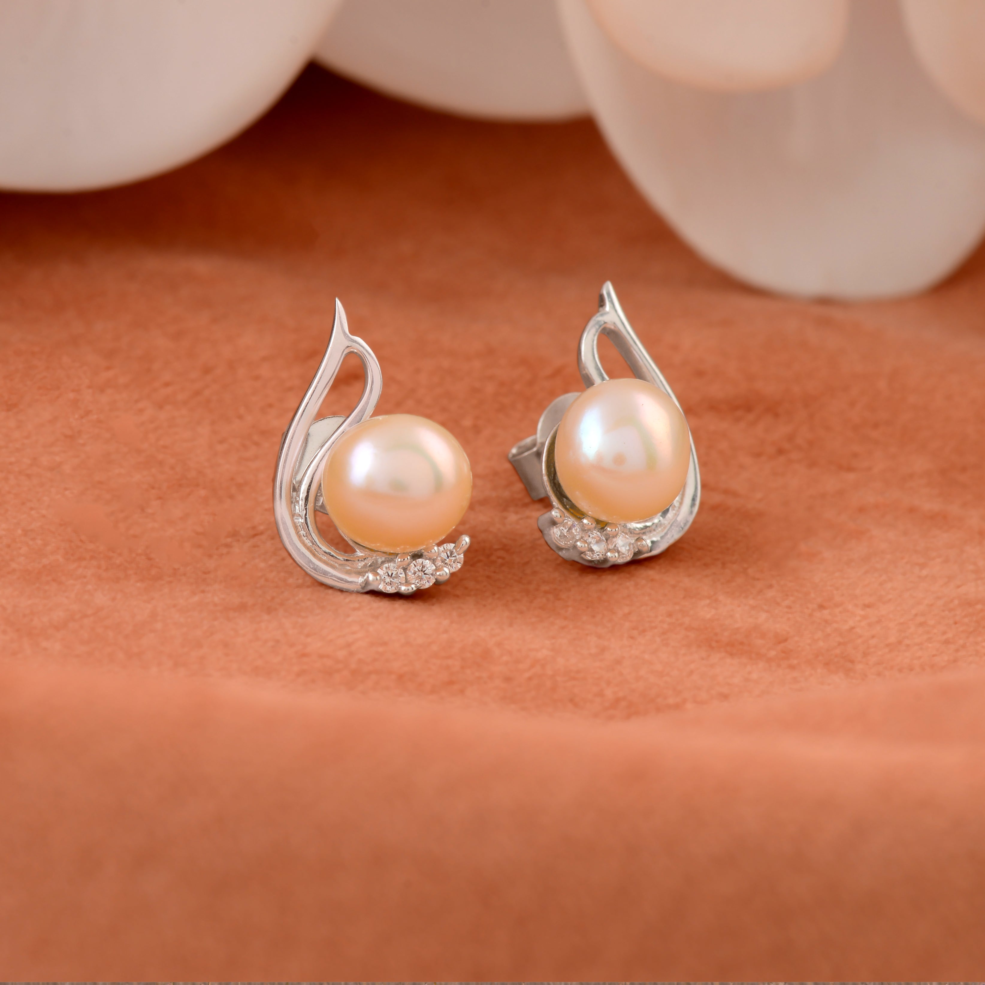 Celestial Glow: Unique Peach Pearl Studs With CZ Sparkle