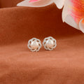 Round silver-plated stud earrings