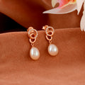 Rope knot gold earrings with pearls