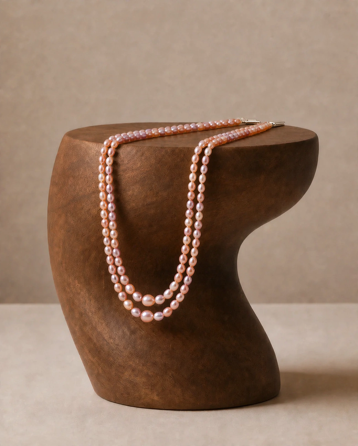 Traditional Graded Oval Peach and Pink Pearl Necklace