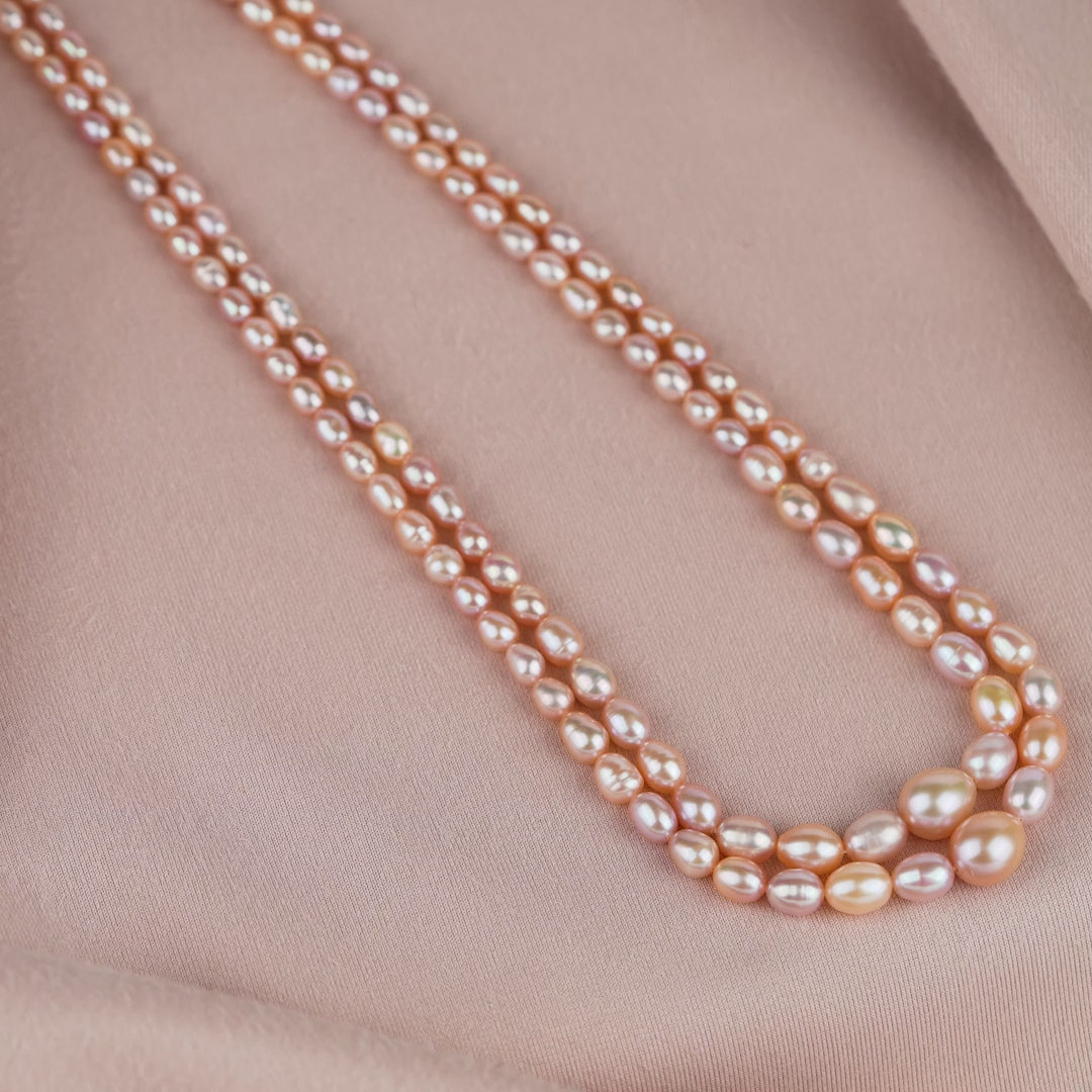 Traditional Graded Oval Peach and Pink Pearl Necklace