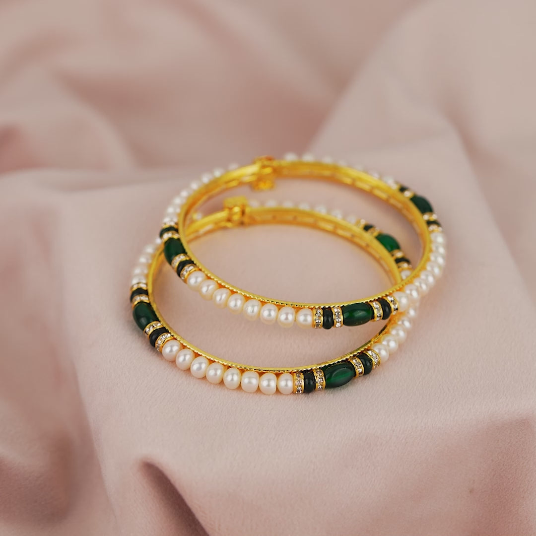 Pearl Bangles set with green and cz stones