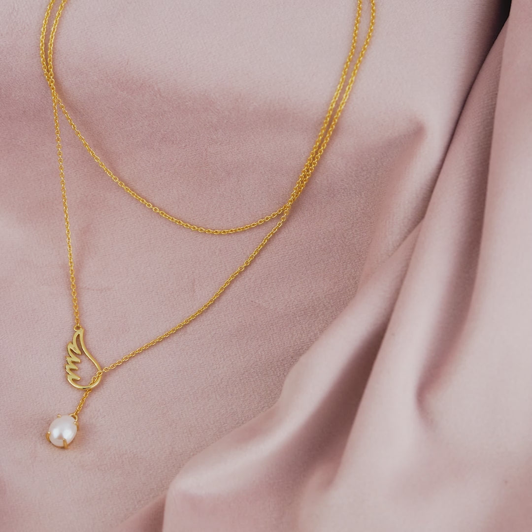 Shattered Serenity: Ethereal Elegance In Broken Angel Pearl Drop Necklace