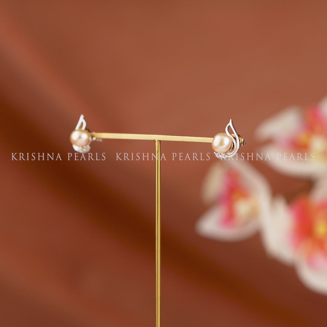 Celestial Glow: Unique Peach Pearl Studs With CZ Sparkle